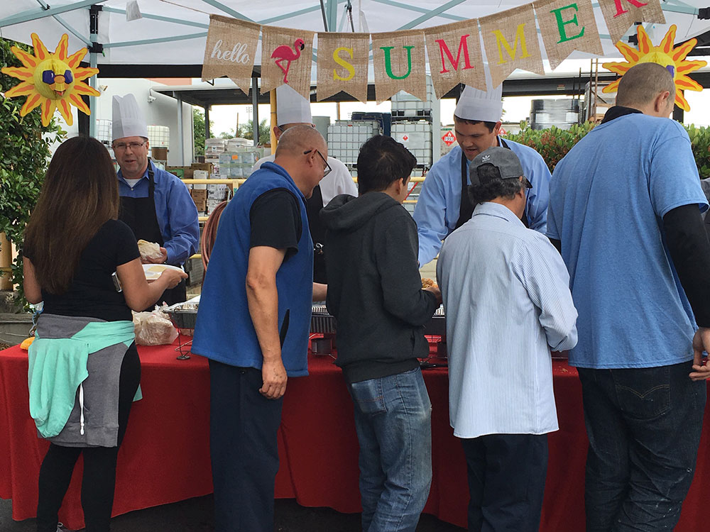 people getting food from buffet